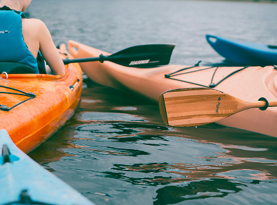 Back of Kayaks in Lake